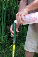 Funnel handle on Weed Wand herbicide applicator prevents spills and waste.